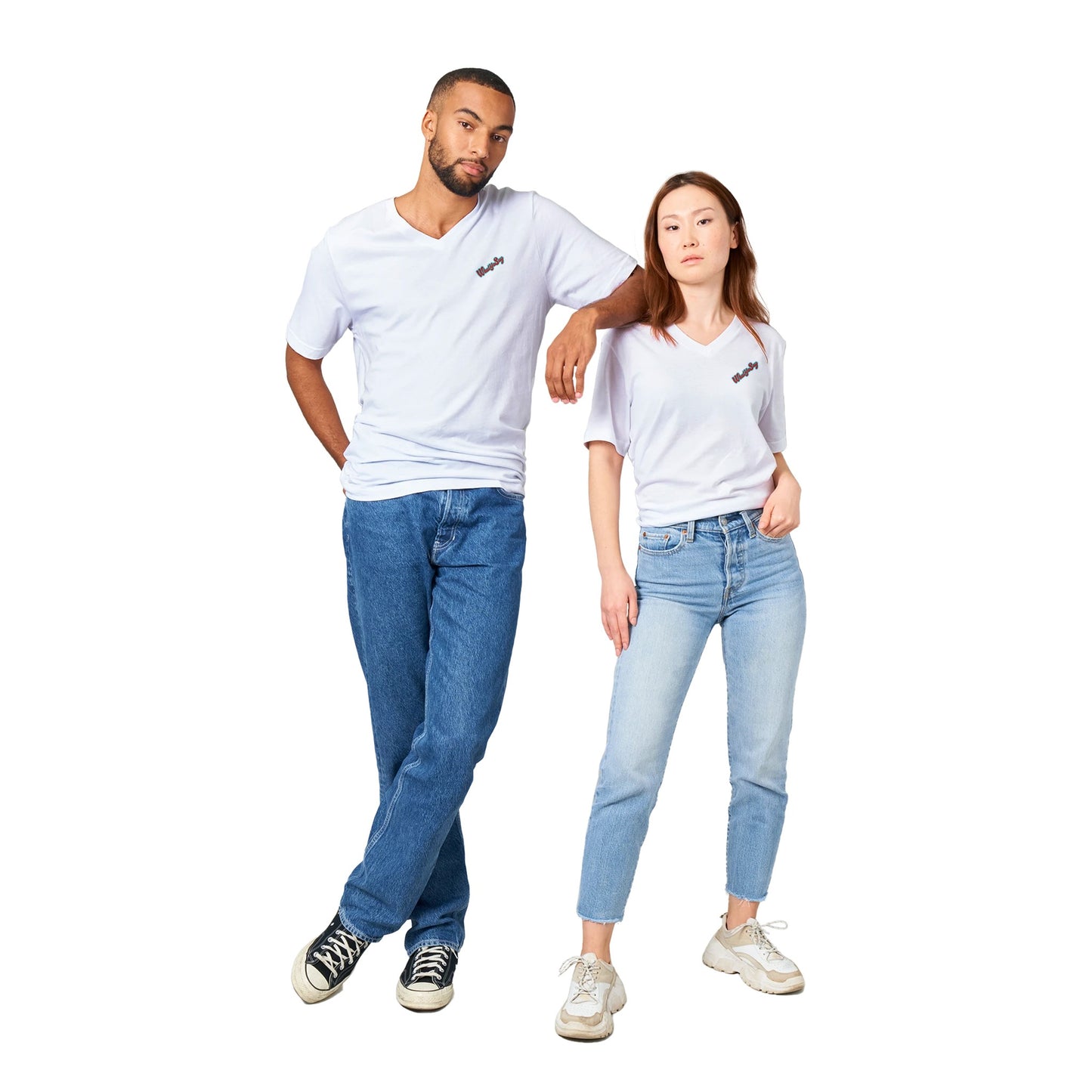 A man and Asian woman couple standing side by side wearing a WhatYa Say white premium Unisex v-neck t-shirt with original artwork and motto Don’t Judge Me Till You’ve Drank from my margarita on the back from WhatYa Say Apparel.