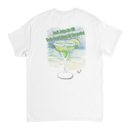 A white heavyweight Unisex Crewneck t-shirt with original artwork and motto Don’t Judge Me Till You’ve Drank from my margarita on back of t-shirt.