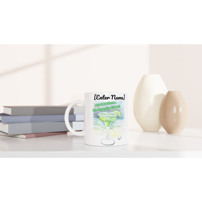 Personalized white ceramic 11oz mug with motto I Got 99 Problems But a Margarita Aint One on the front and WhatYa Say logo on the back  dishwasher and microwave safe from WhatYa Say Apparel sitting on coffee table with books and two vases.