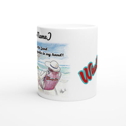 Side view of Personalized white ceramic 11oz mug with original personalized motto [Your Name] I need my Ass in the Sand and a Margarita in my hand on the front and WhatYa Say logo on the back coffee mug dishwasher and microwave safe from WhatYa Say Apparel.