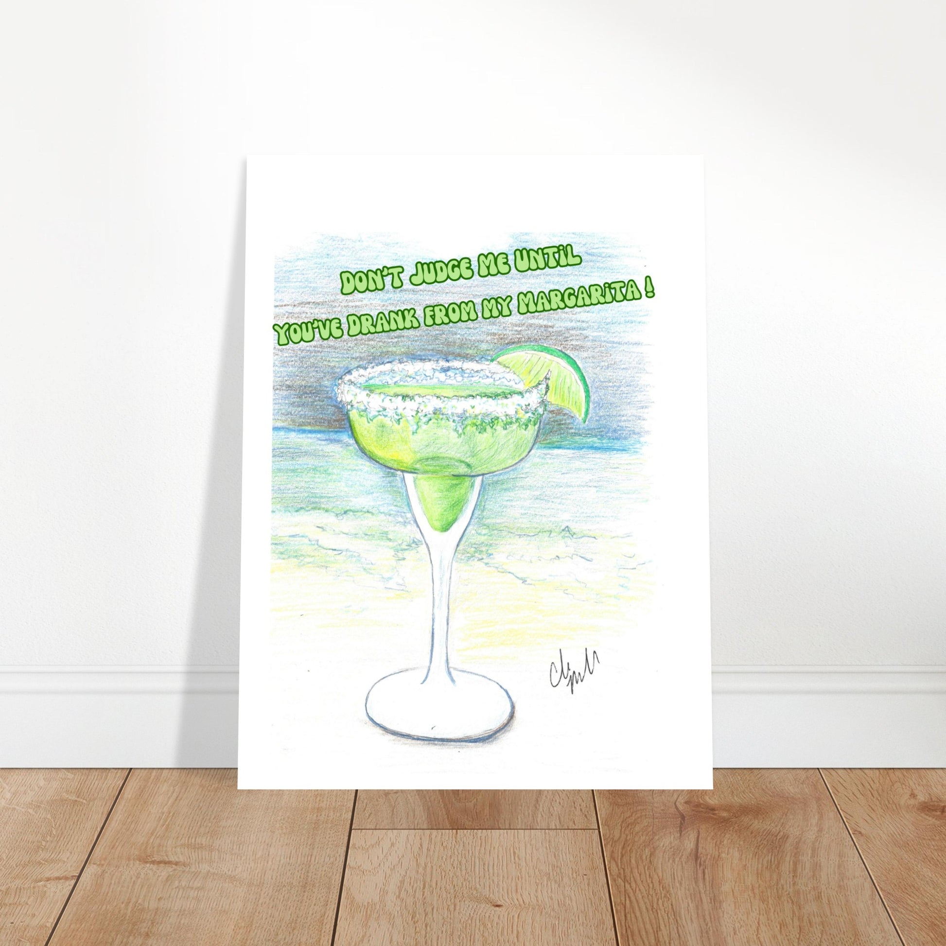Don't Judge Me Until You've Drank From My Margarita Premium Matt Poster on 80 lb paper leaning on white wall with brown wood flooring.