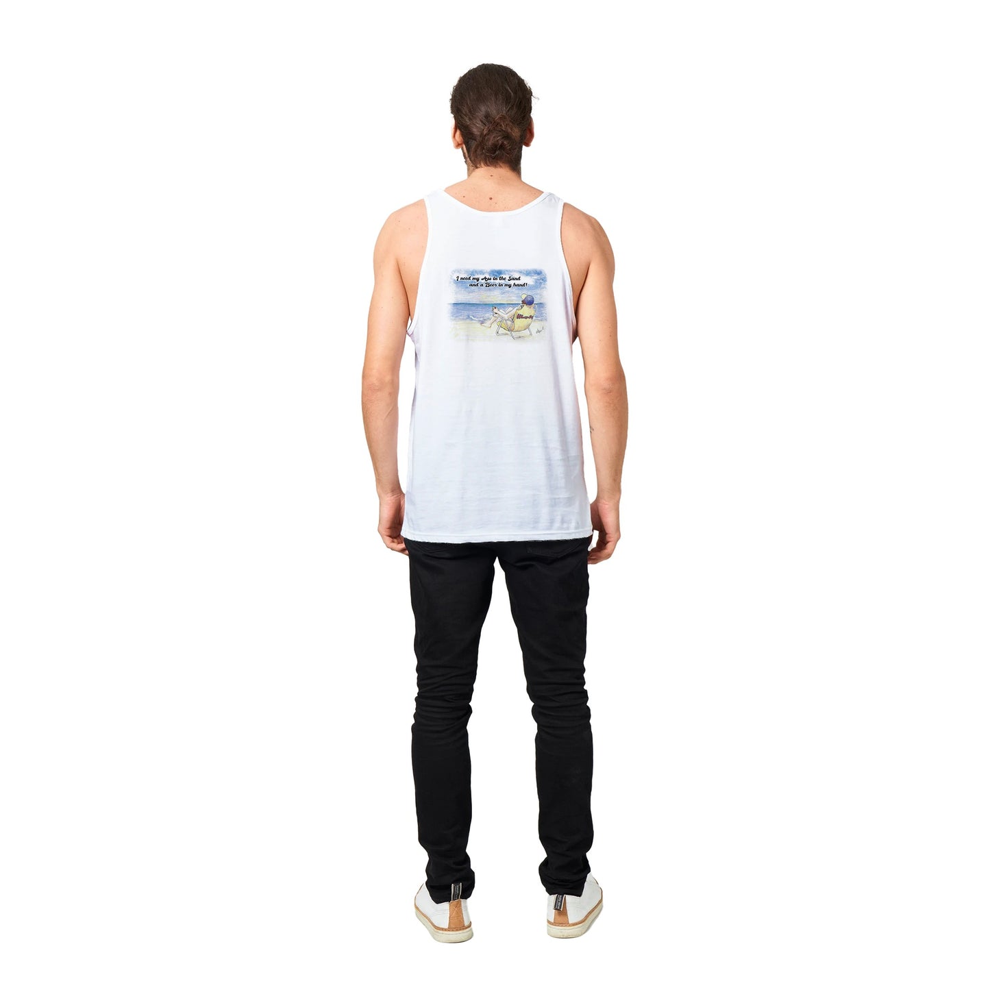 A white Premium Unisex Tank Top with original artwork and motto I need my Ass in the Sand and a Beer in my hand on back with WhatYa Say Logo on front from combed and ring-spun cotton from WhatYa Say Apparel a brown-haired male model standing back view.