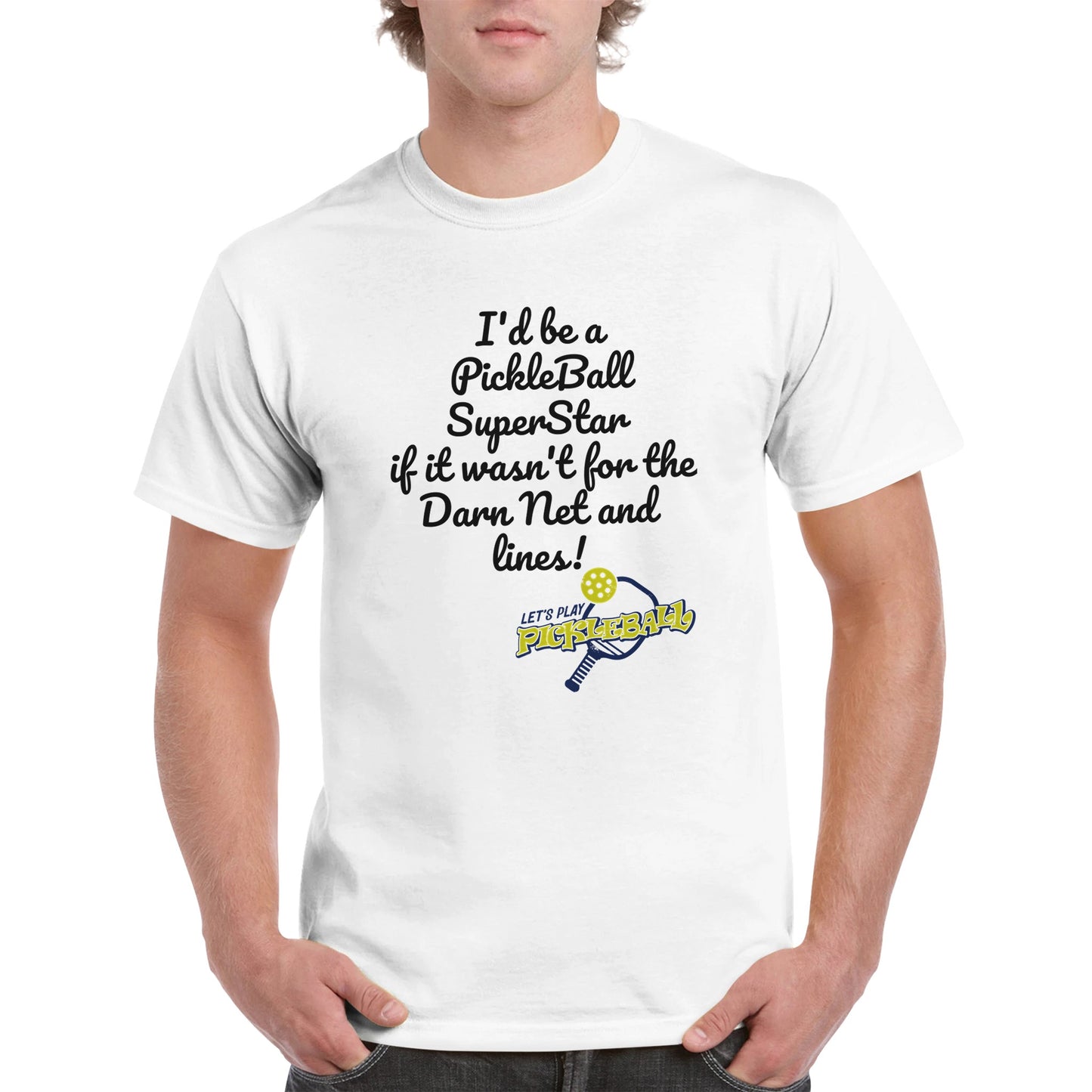 A white comfortable Unisex Crewneck heavyweight cotton t-shirt with funny saying I’d be a PickleBall SuperStar if it wasn’t for the Darn Net and Lines and Let’s Play Pickleball logo on the front from WhatYa Say Apparel worn by blonde-haired male front view.