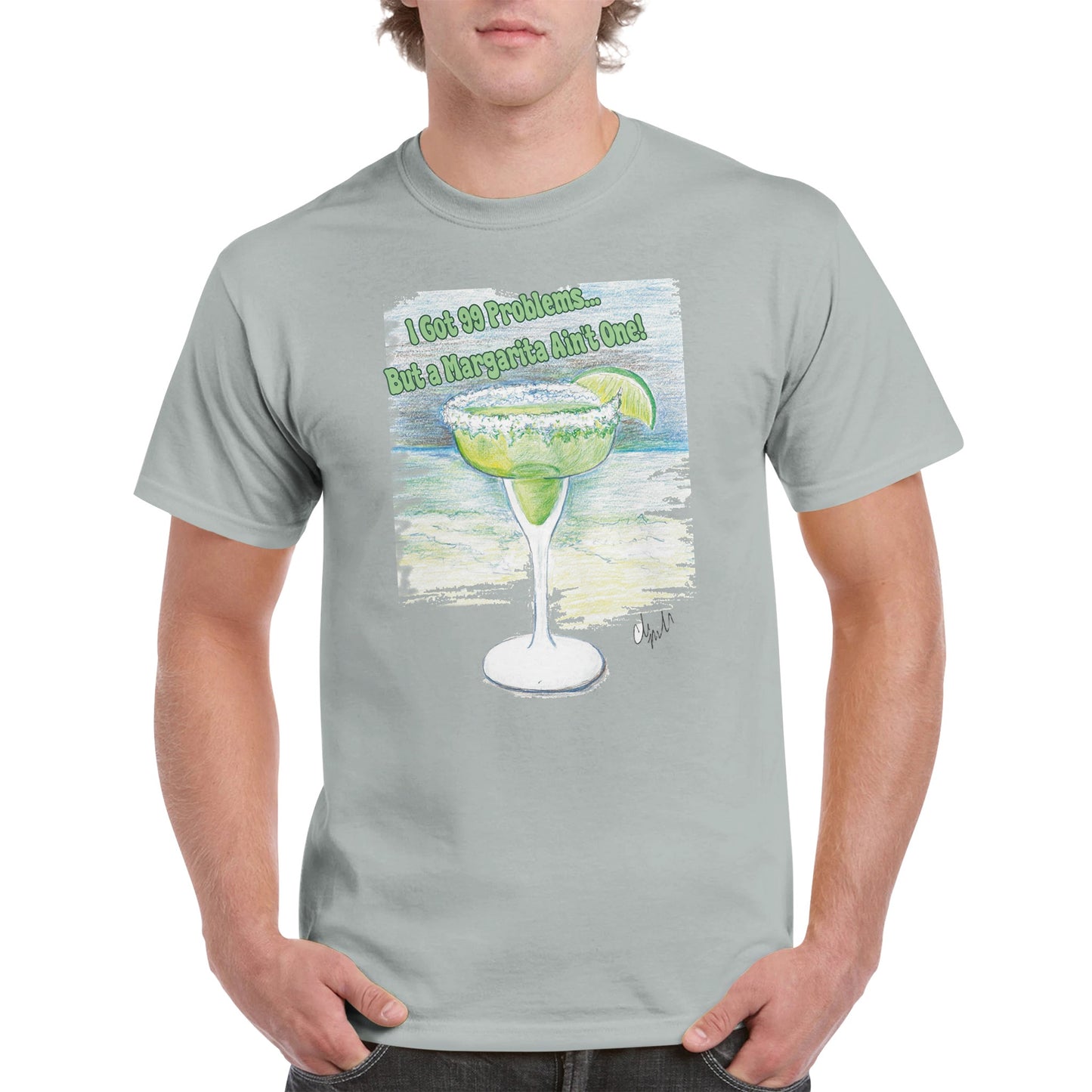 A ash heavyweight Unisex Crewneck cotton t-shirt with original artwork I Got 99 Problems… But A Margarita Ain’t One! on the front from WhatYa Say Apparel worn by blonde-haired male front view.