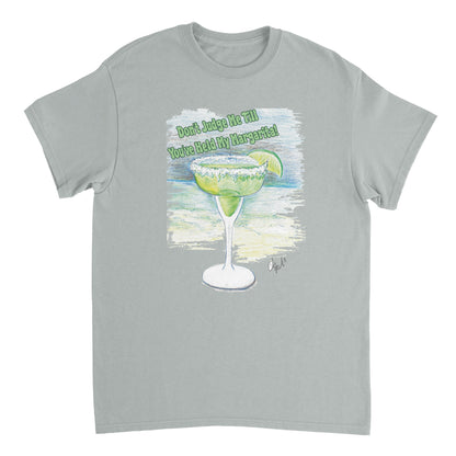 A ash heavyweight Unisex Crewneck t-shirt with original artwork and motto Don’t Judge Me Till You’ve Held my margarita on front of t-shirt from WhatYa Say Apparel.