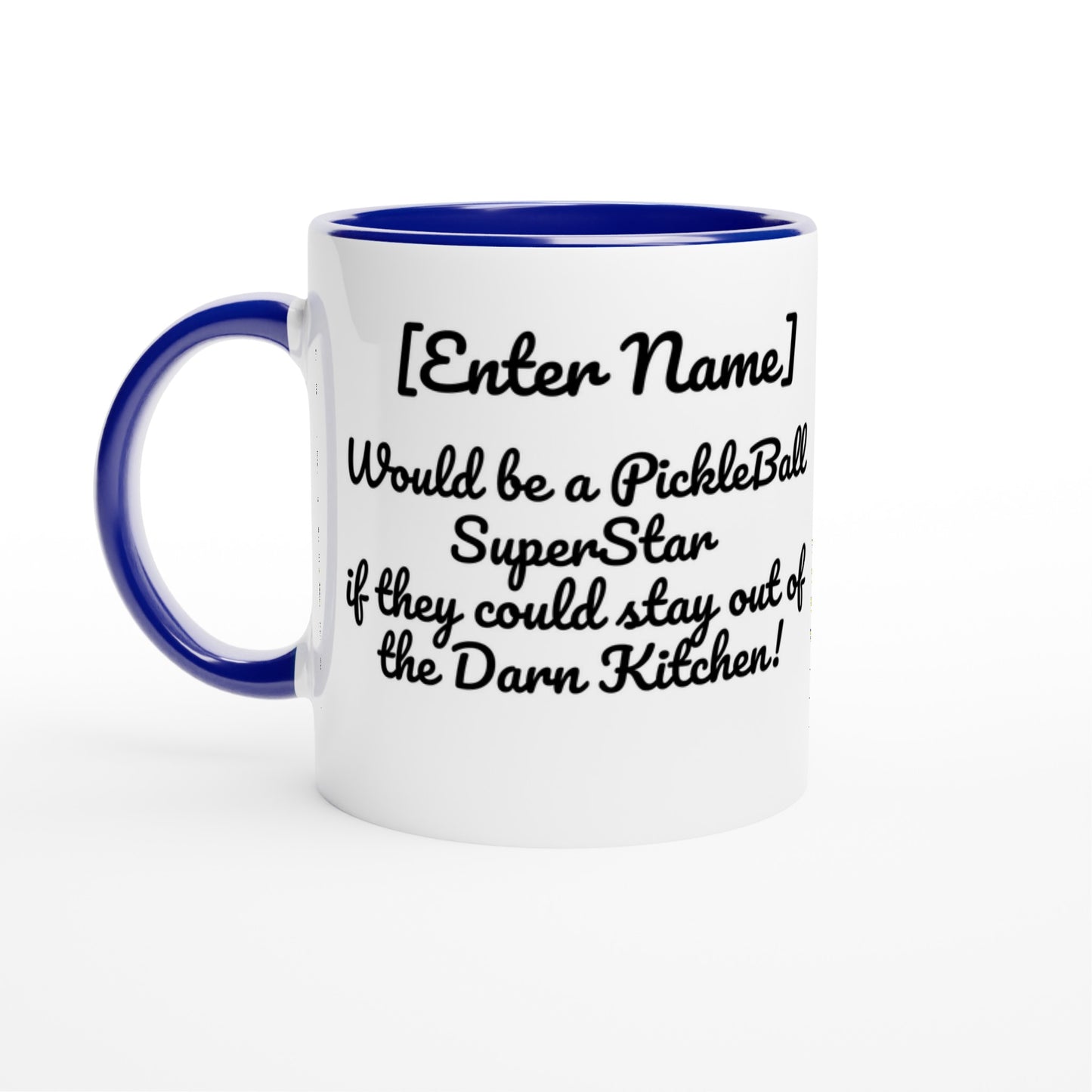 White ceramic 11oz mug with blue handle  Personalized with motto Your Name Would be a PickleBall Superstar if they could stay out of the Darn Kitchen front side Let's Play PickleBall logo on back dishwasher and microwave safe ceramic coffee mug from WhatYa Say Apparel front view.