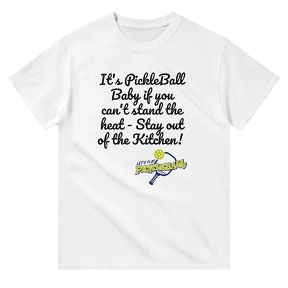 A white comfortable Unisex Crewneck heavyweight cotton t-shirt with funny saying It’s PickleBall Baby if can’t stand the heat – Stay out of the Kitchen!  and Let’s Play Pickleball logo on the front from WhatYa Say Apparel lying flat.