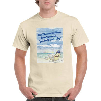 A sand heavyweight Unisex Crewneck t-shirt with original artwork and motto Don’t borrow Problems from Tomorrow… You don’t need Today! on front with WhatYa Say logo on image from WhatYa Say Apparel worn by blonde-haired male front view.