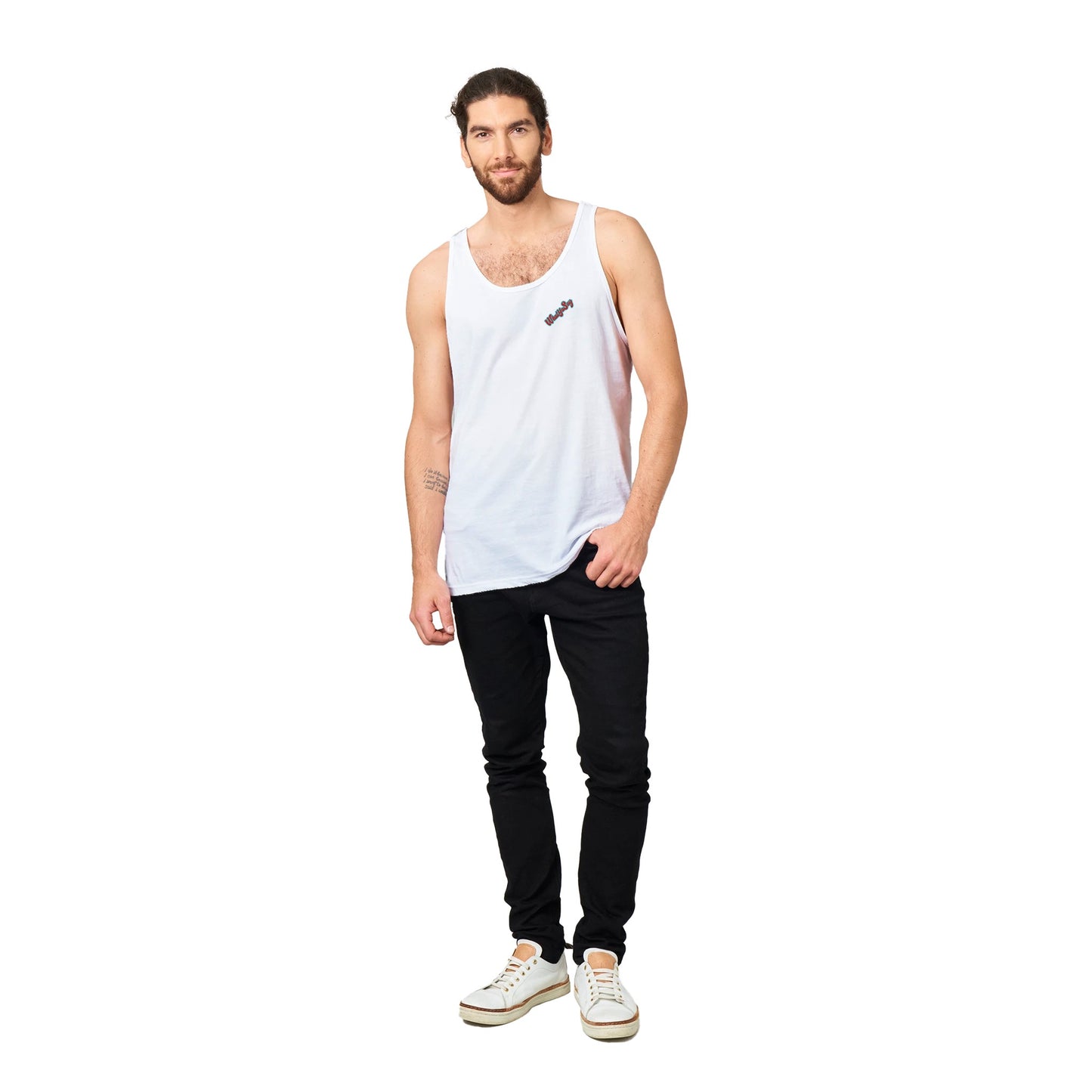 A white Premium Unisex Tank Top with original artwork and motto Don’t Judge Me Till You’ve Held my Margarita on back with WhatYa Say Logo on front from combed and ring-spun cotton from WhatYa Say Apparel a brown-haired male model standing front view.