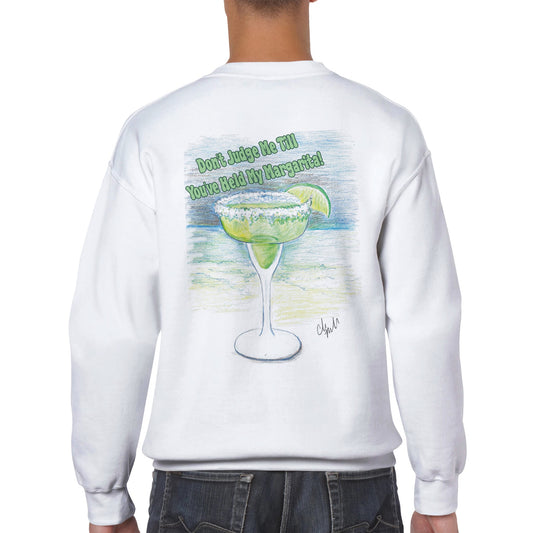 A rear view of short haired male model wearing a white Classic Unisex Crewneck sweatshirt with original artwork and motto Don’t Judge Me Till You’ve Held my margarita on back and Whatya Say logo on front from WhatYa Say Apparel.