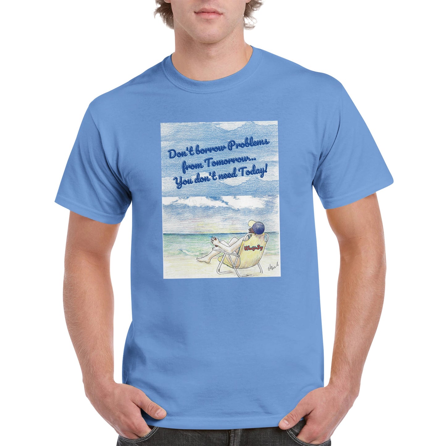A Carolina Blue heavyweight Unisex Crewneck t-shirt with original artwork and motto Don’t borrow Problems from Tomorrow… You don’t need Today! on front with WhatYa Say logo on image from WhatYa Say Apparel worn by blonde-haired male front view.