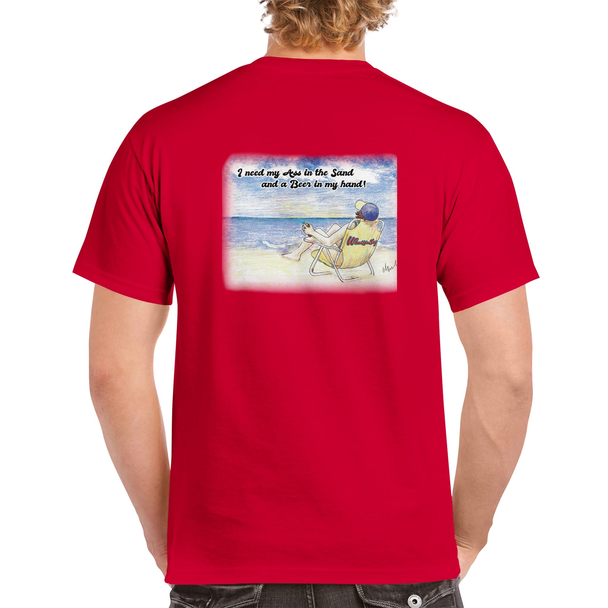 A rear view of blonde-haired male model wearing a red heavyweight Unisex Crewneck t-shirt with original artwork and motto I need my Ass in the Sand back and WhatYa Say logo on front of t-shirt from WhatYa Say Apparel.