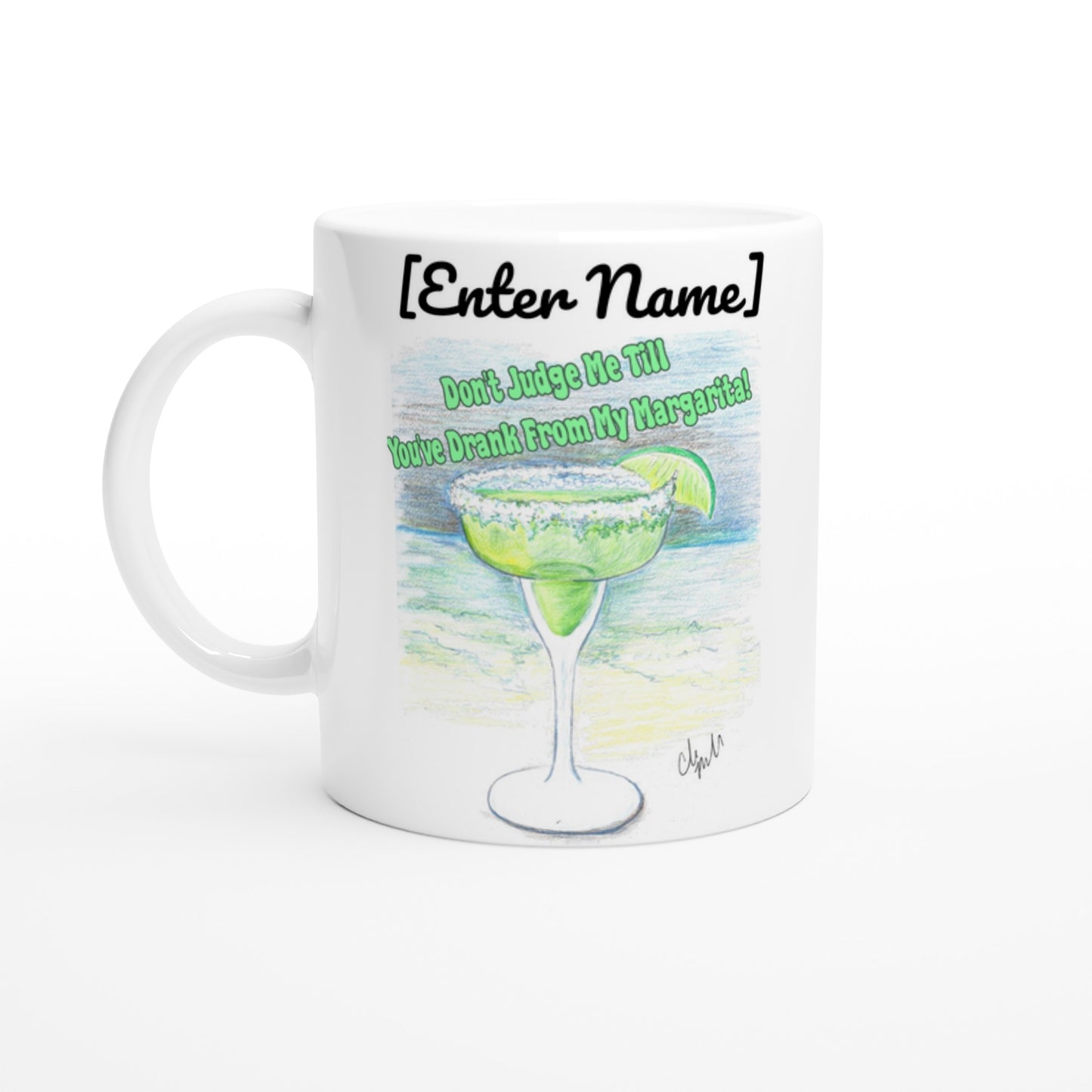 A white pesonalized ceramic 11oz mug with personalized original motto [Your Name Don’t Judge Me Till You’ve Drank From My Margarita on front and WhatYa Say logo on back dishwasher and microwave safe from WhatYa Say Apparel front view.