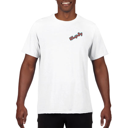 A white Performance Moisture-wicking with PosiCharge Unisex Crewneck t-shirt with original artwork and motto I need my Ass in the Sand and a Margarita in my hand on back of t-shirt and WhatYa Say logo on front from WhatYa Say Apparel a front view of happy African American male model.