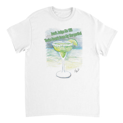 A white short sleeve heavyweight Unisex Crewneck t-shirt with original artwork and motto Don’t Judge Me Till You’ve Drank from my margarita laying flat.