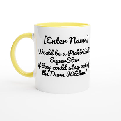 Personalized White ceramic 11oz mug with yellow handle Personalized with motto Your Name Would be a PickleBall Superstar if they could stay out of the Darn Kitchen front side  Let's Play PickleBall logo on back dishwasher and microwave safe ceramic coffee mug from WhatYa Say Apparel front view.