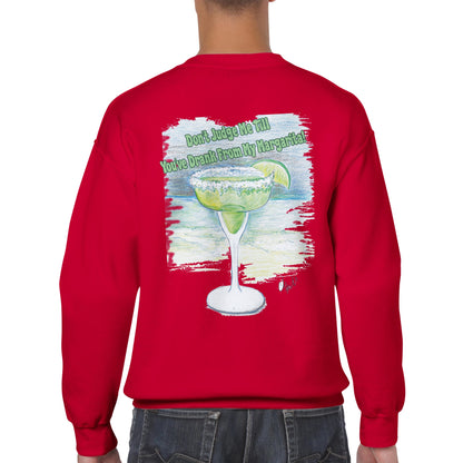 A red Classic Unisex Crewneck sweatshirt with original artwork and motto Don’t Judge Me Till You’ve Drank From My Margarita on back and Whatya Say logo on front from WhatYa Say Apparel a rear view of short haired male model.