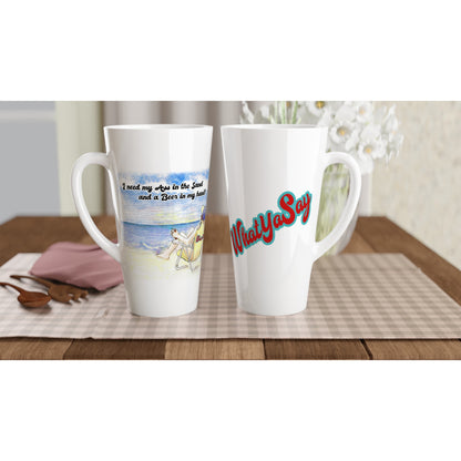 Two Seventeener white ceramic 17oz mugs with original motto I need my Ass in the Sand and a Beer in my hand on front and WhatYa Say logo on back dishwasher and microwave safe from WhatYa Say Apparel sitting on coffee table with green and white placemat. 
