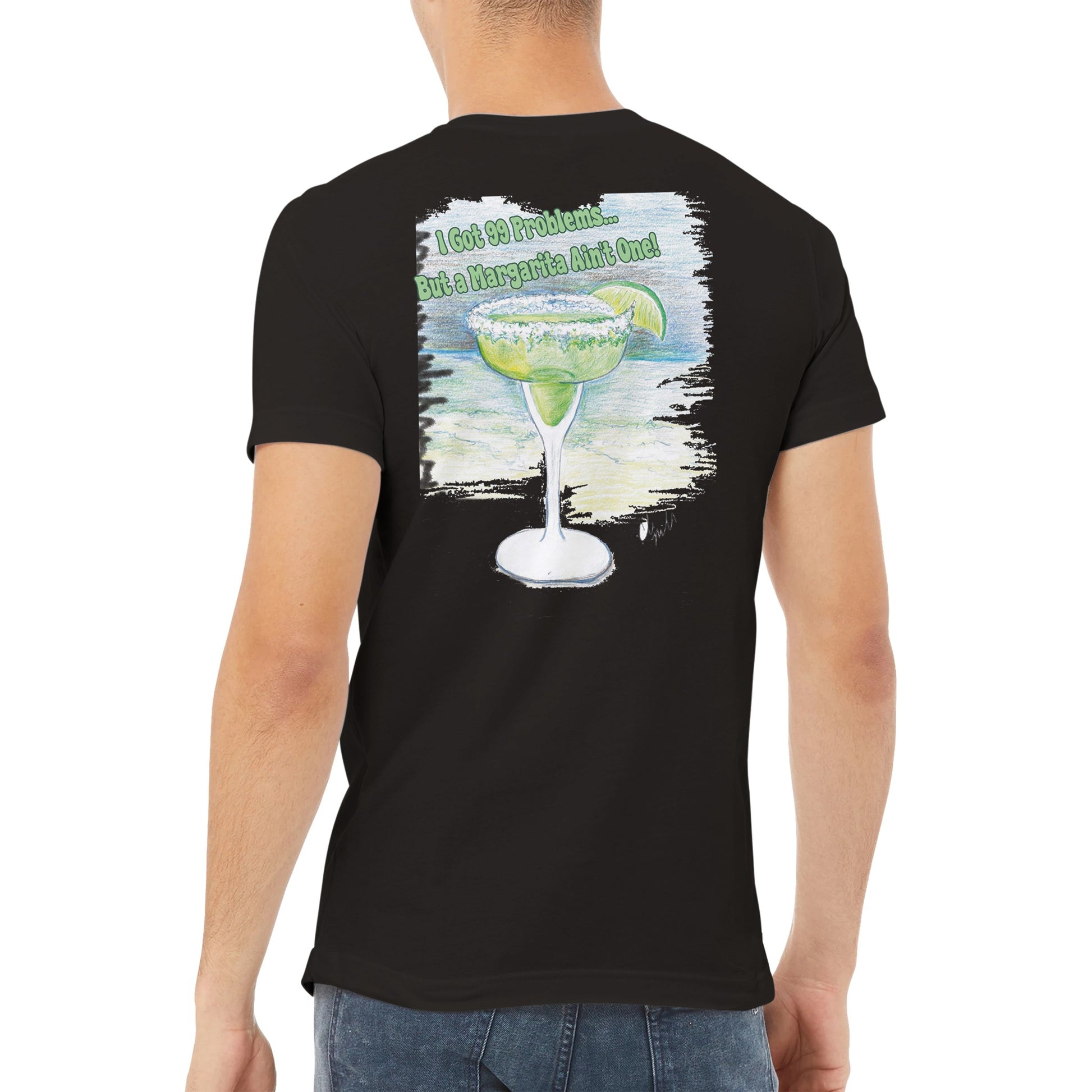 A black premium unisex v-neck t-shirt with original artwork and motto I Got 99 Problems But a Margarita Aint One on back and WhatYa Say logo on front made with combed and ring-spun cotton from WhatYa Say Apparel worn by A brown-haired male back view.