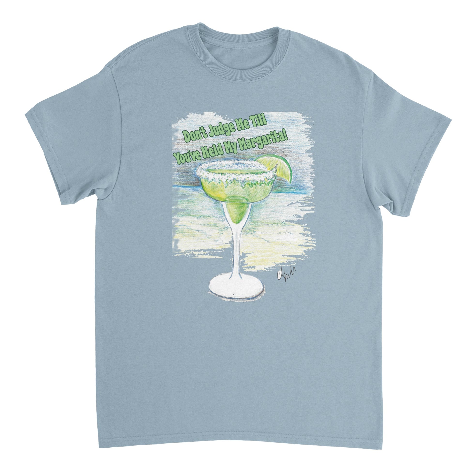 A light blue heavyweight Unisex Crewneck t-shirt with original artwork and motto Don’t Judge Me Till You’ve Held my margarita on front of t-shirt from WhatYa Say Apparel.