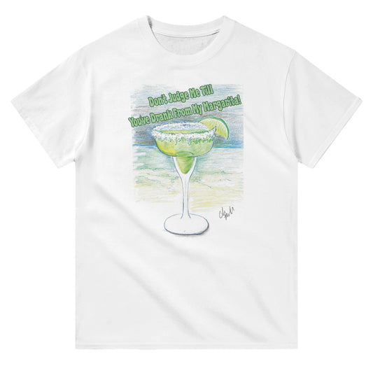 A white heavyweight Unisex Crewneck t-shirt with original artwork and motto Don’t Judge Me Till You’ve Drank from my margarita on front of t-shirt.